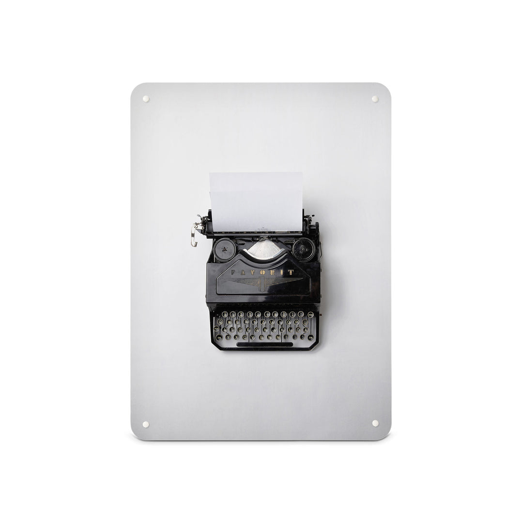 A medium magnetic notice board by Beyond the Fridge with a photograph of a vintage typewriter on a white background
