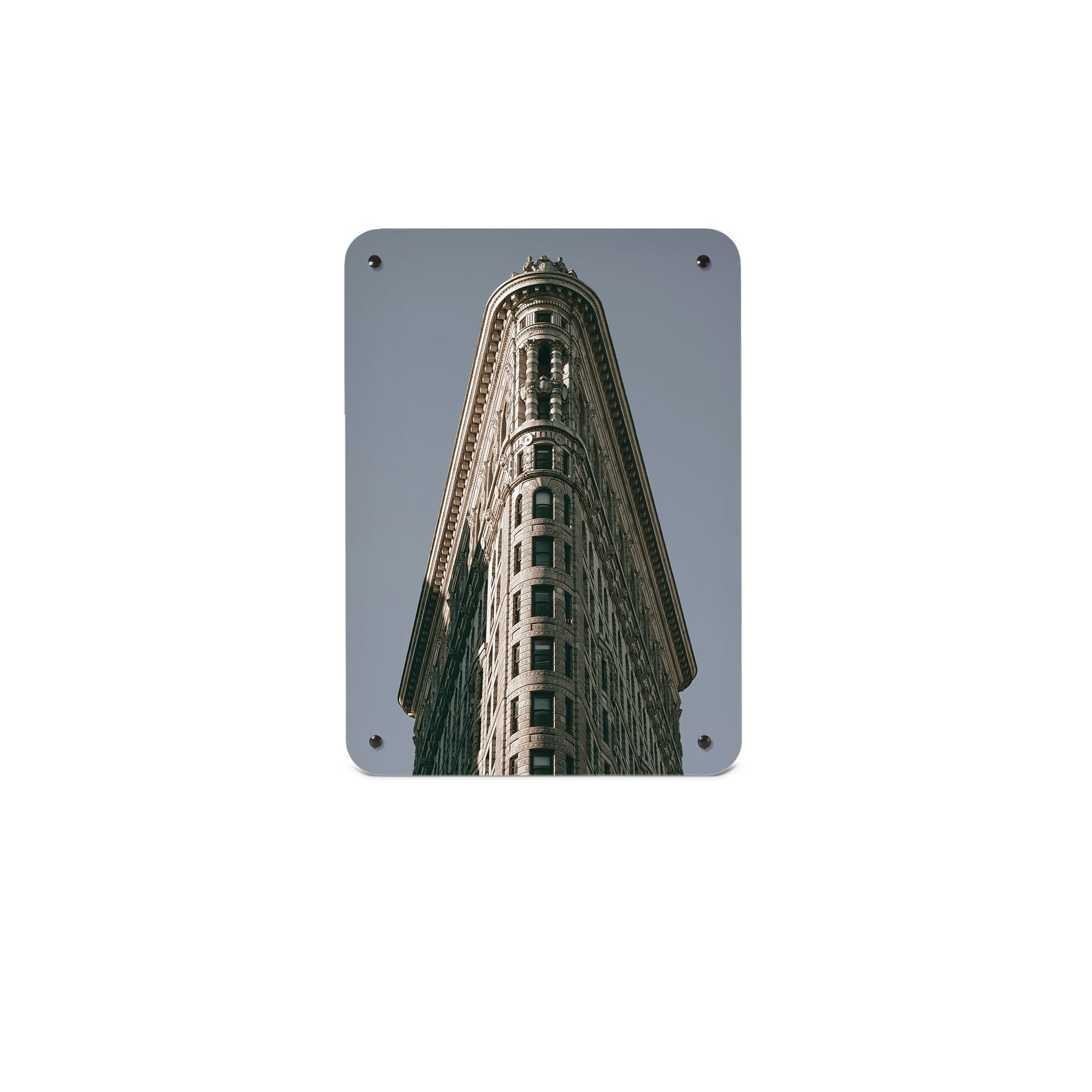 A small magnetic notice board by Beyond the Fridge with an image of the flatiron building in Manhattan 