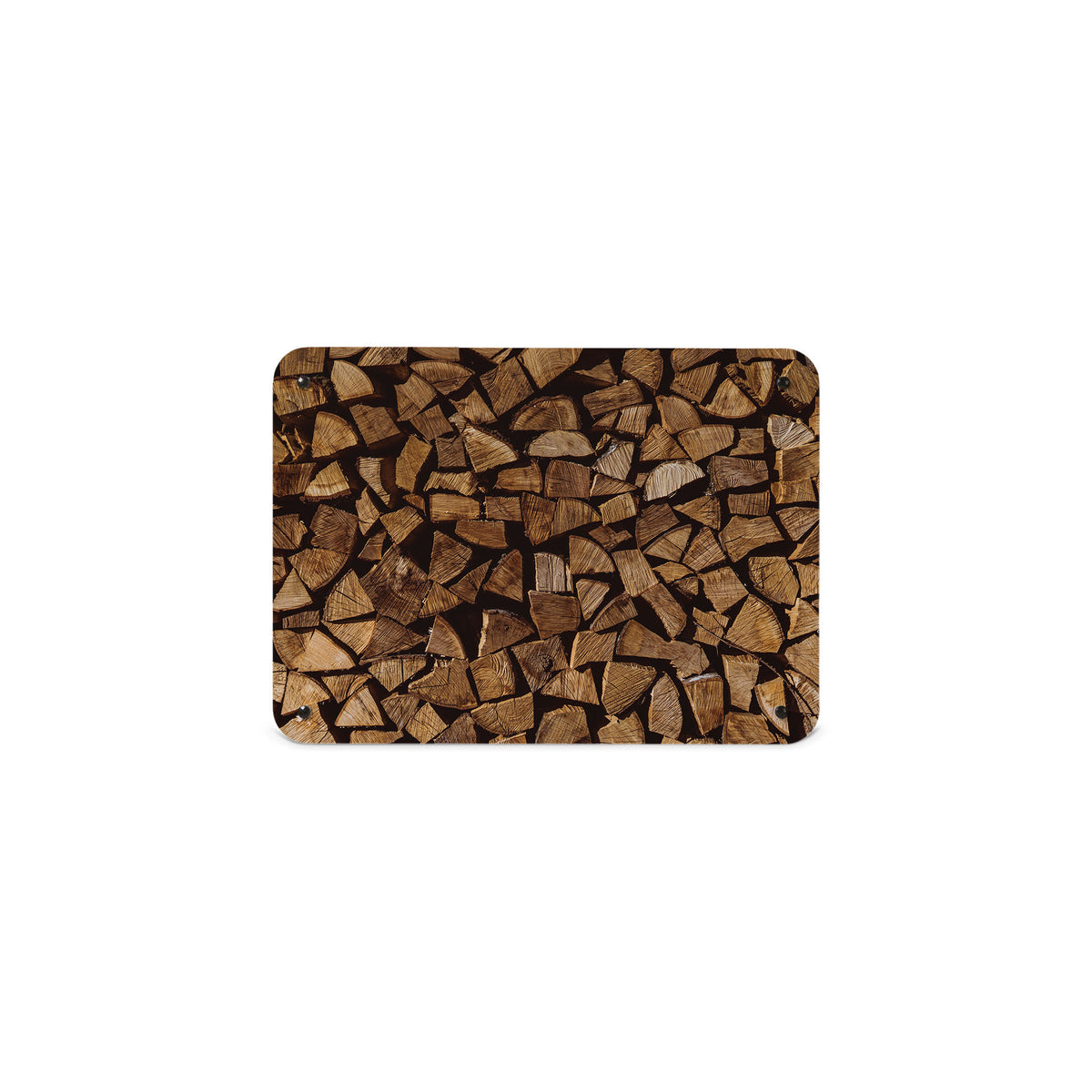 A small magnetic notice board by Beyond the Fridge with a photograph of a pile of logs