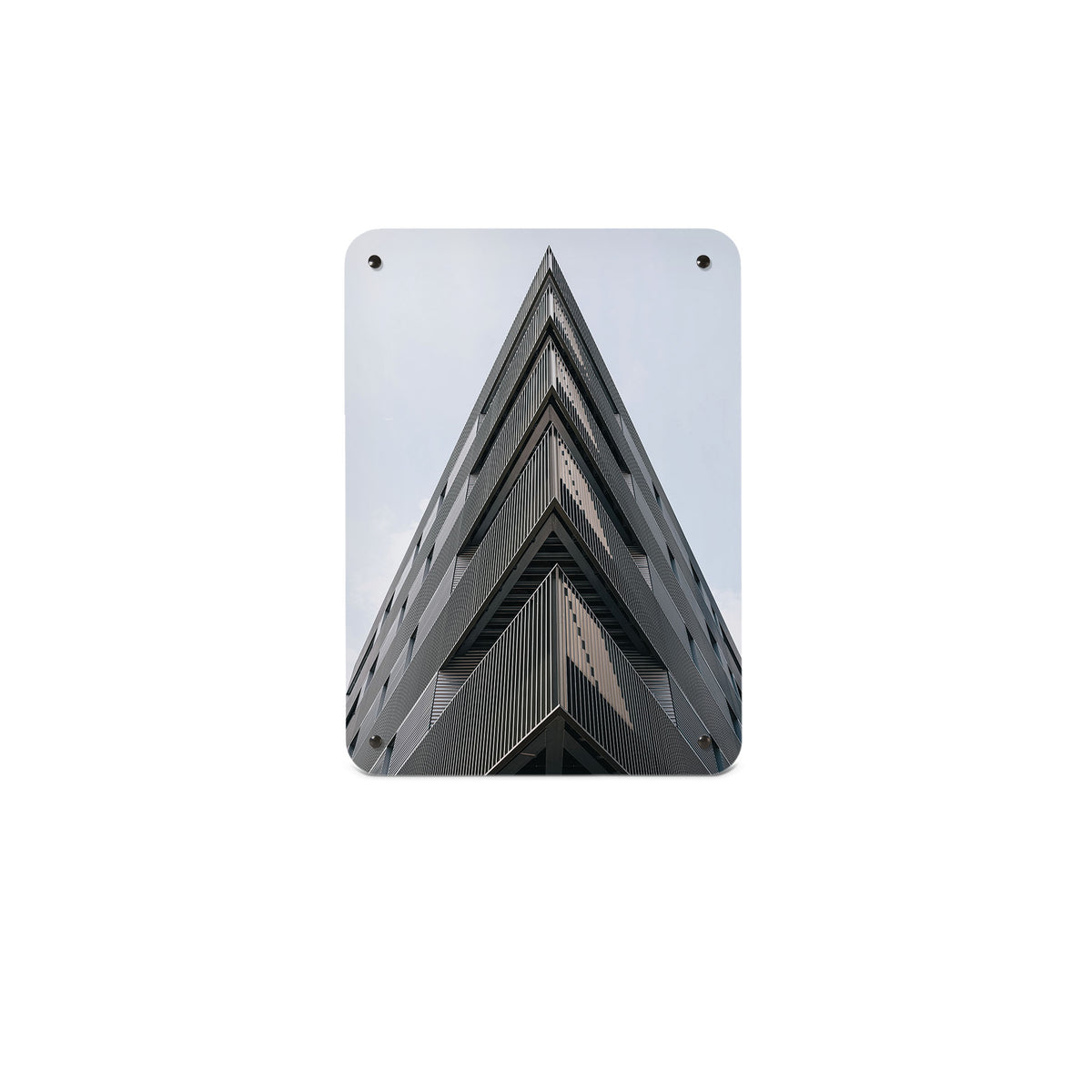 A small magnetic notice board by Beyond the Fridge with a black and white photographic image of a London Skyscraper