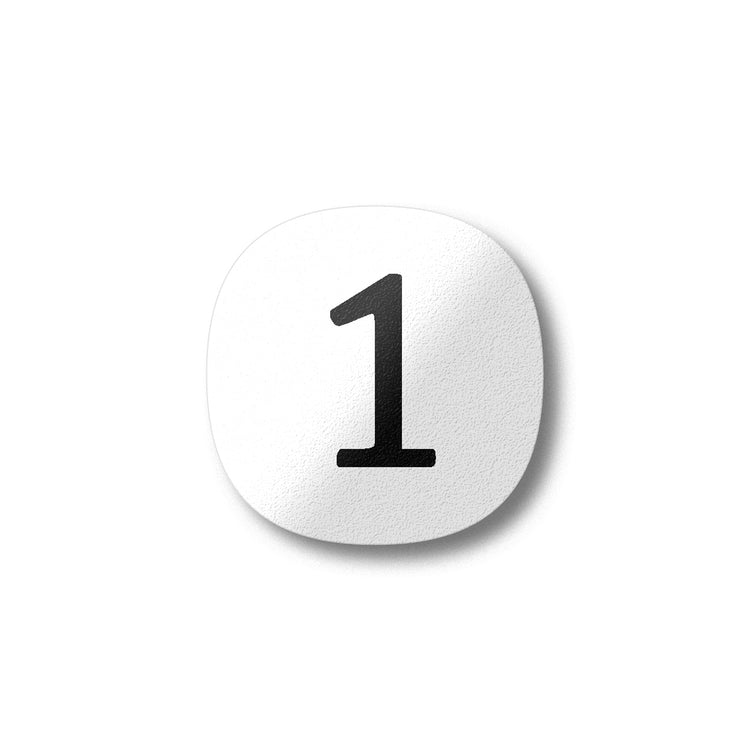 A black number one on a white background design plywood fridge magnet by Beyond the Fridge