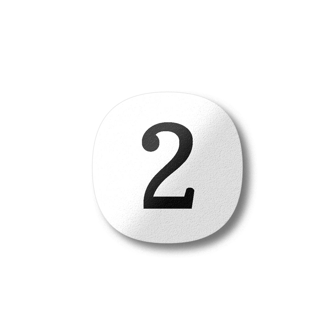 A black number two on a white background design plywood fridge magnet by Beyond the Fridge