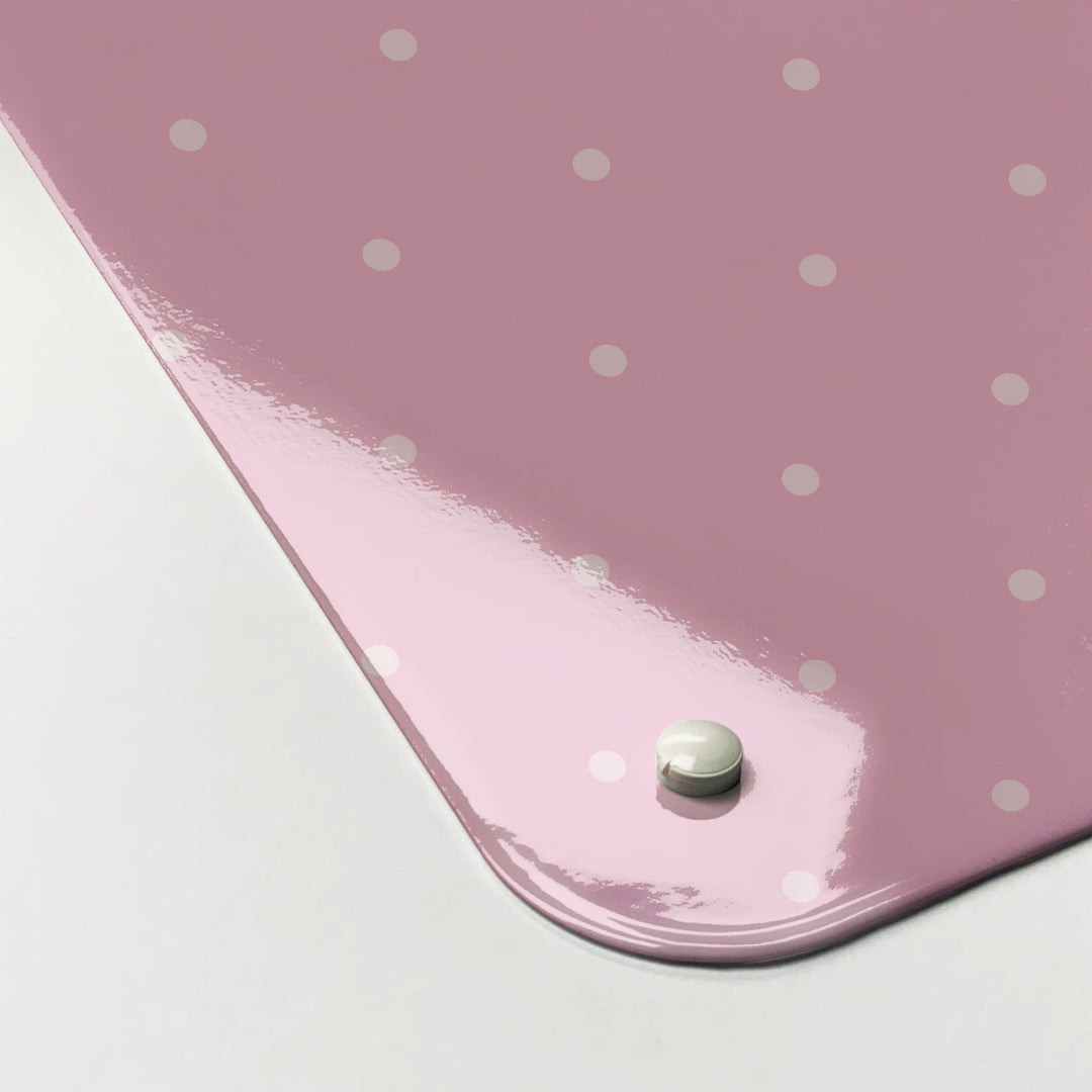 The corner detail of a polkadots on pink design magnetic board to show it’s high gloss surface