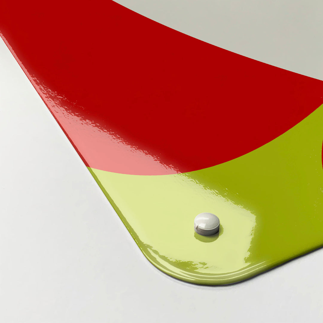 The corner detail of a red apples design magnetic board to show it’s high gloss surface