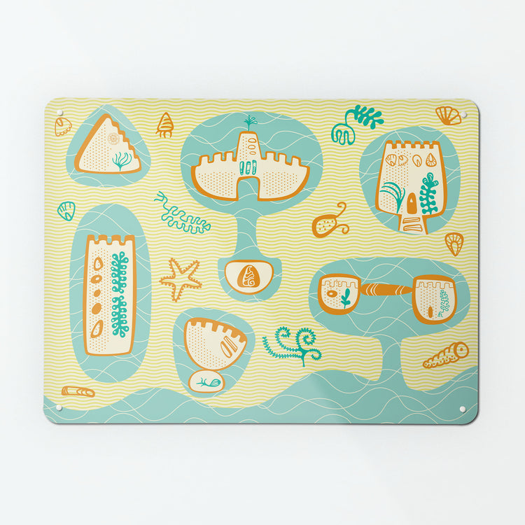 A large magnetic notice board by Beyond the Fridge with a sandcastles design
