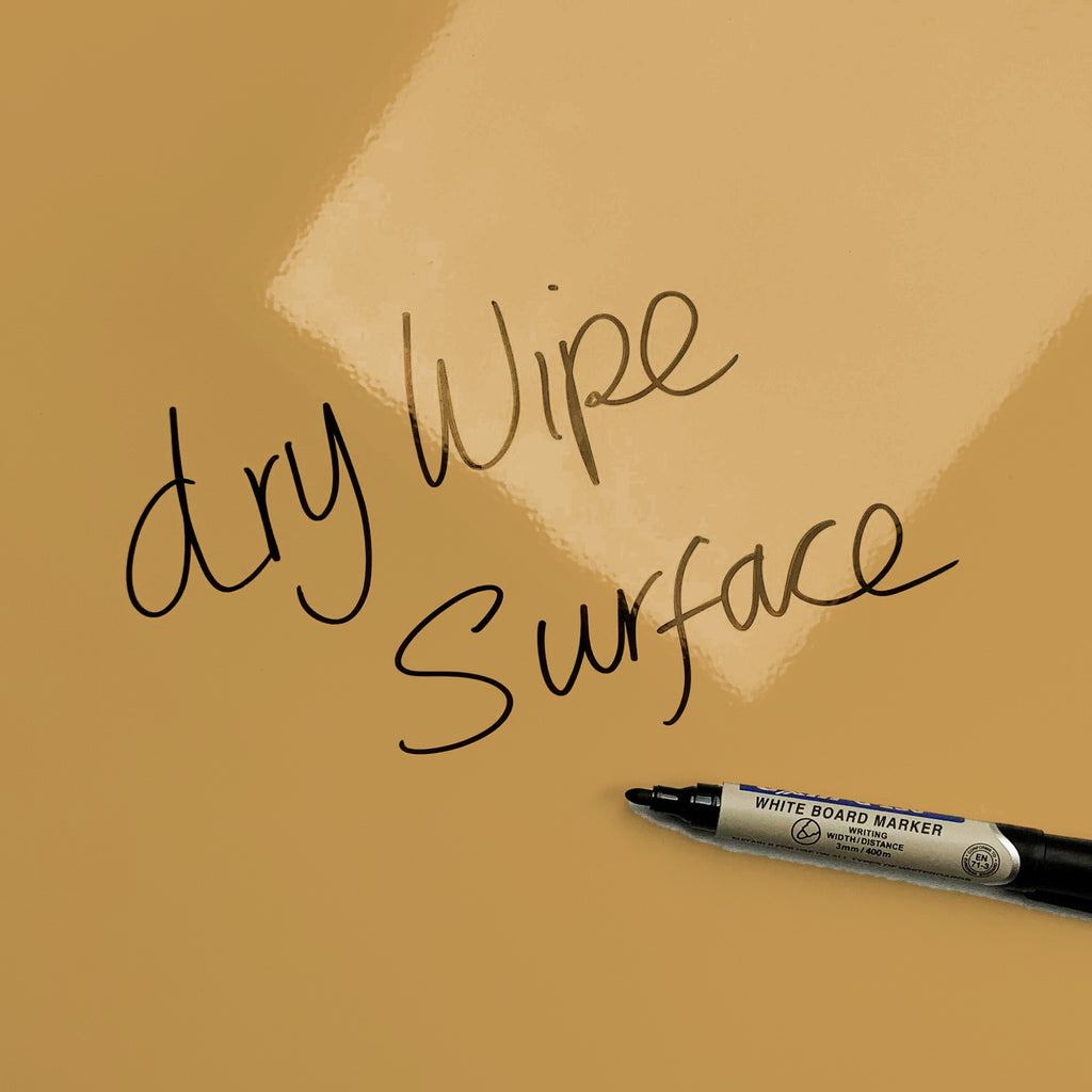 The words dry wipe surface written in marker pen on the Shoreline Shells magnetic notice board