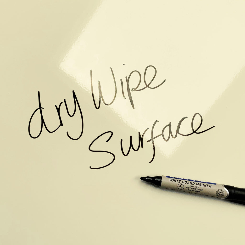 The words dry wipe surface written in marker pen on the Snakes and Ladders Snakes And Ladders magnetic notice board