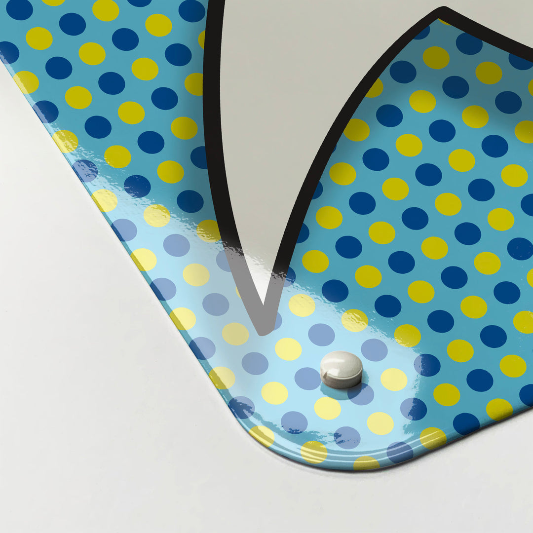The corner detail of a cartoon speech bubble blue and yellow magnetic board to show it’s high gloss surface