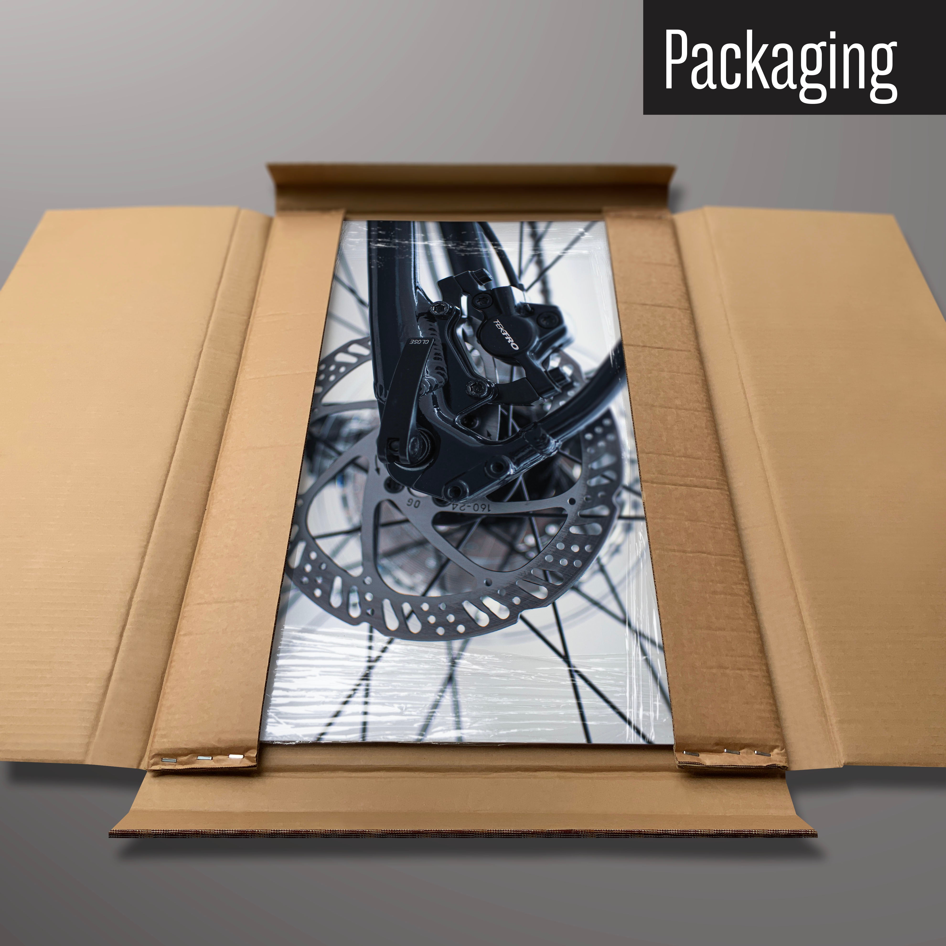 A bicycle spokes magnetic board in it’s cardboard packaging