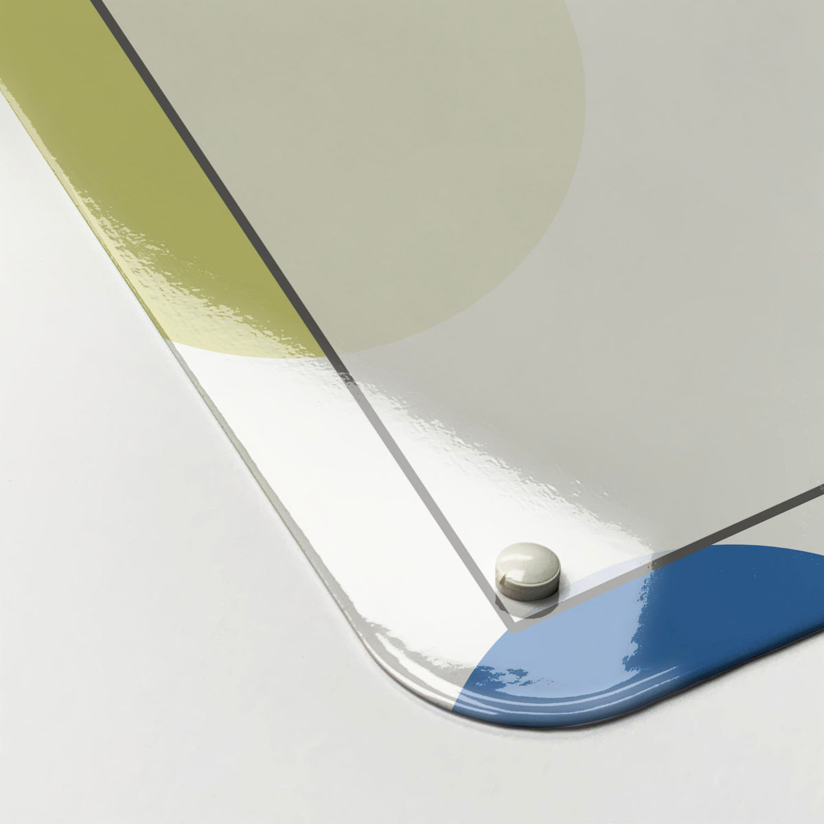 The corner detail of a personalised spots design weekly planner magnetic board to show it’s high gloss surface