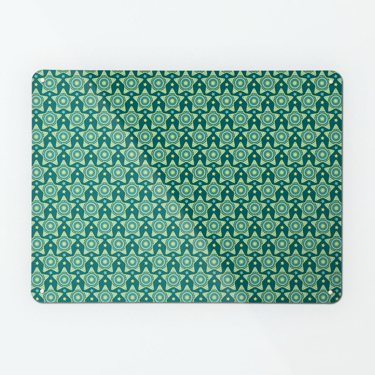 A large magnetic notice board by Beyond the Fridge with a stars on teal pattern