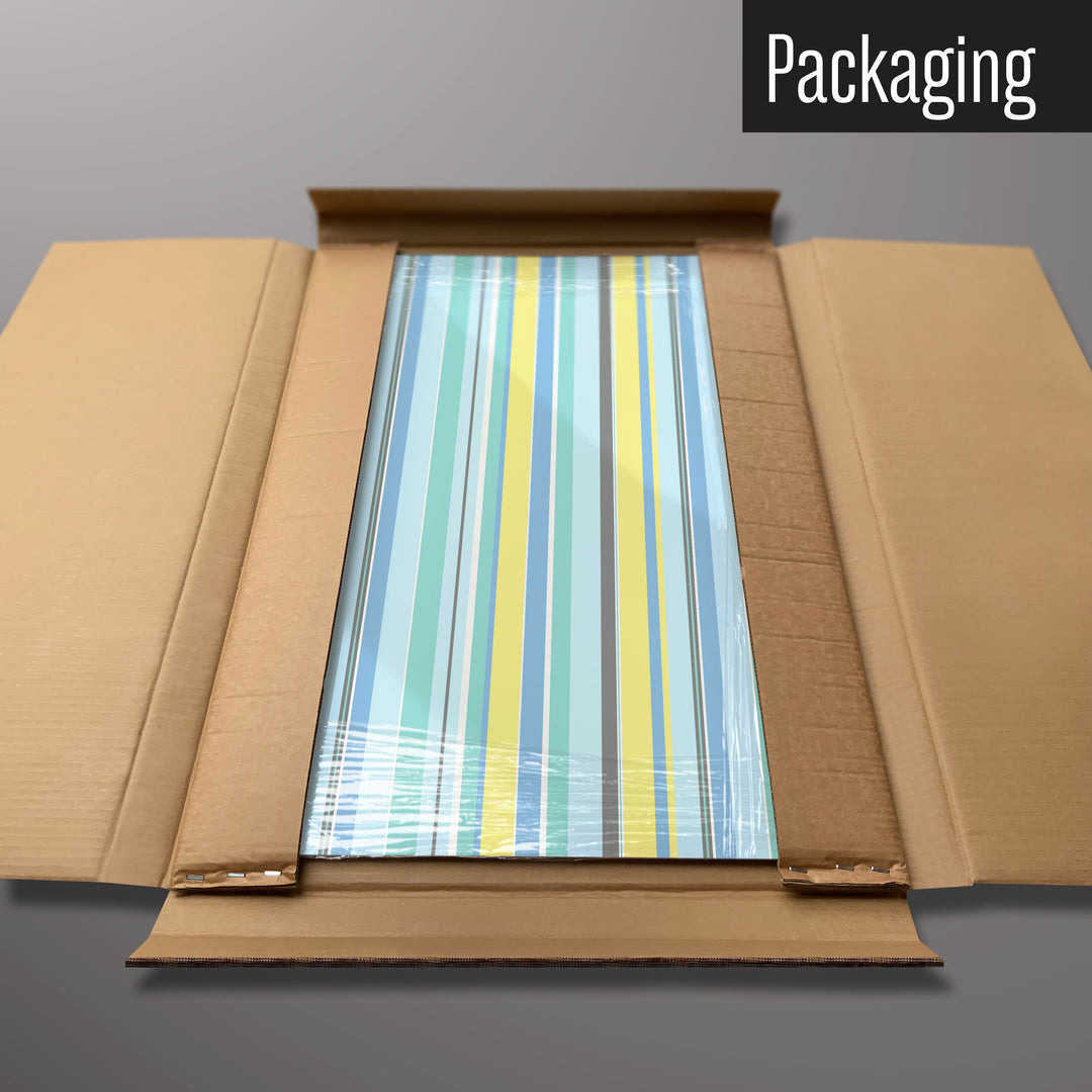 A stripes design beach magnetic board in it’s cardboard packaging