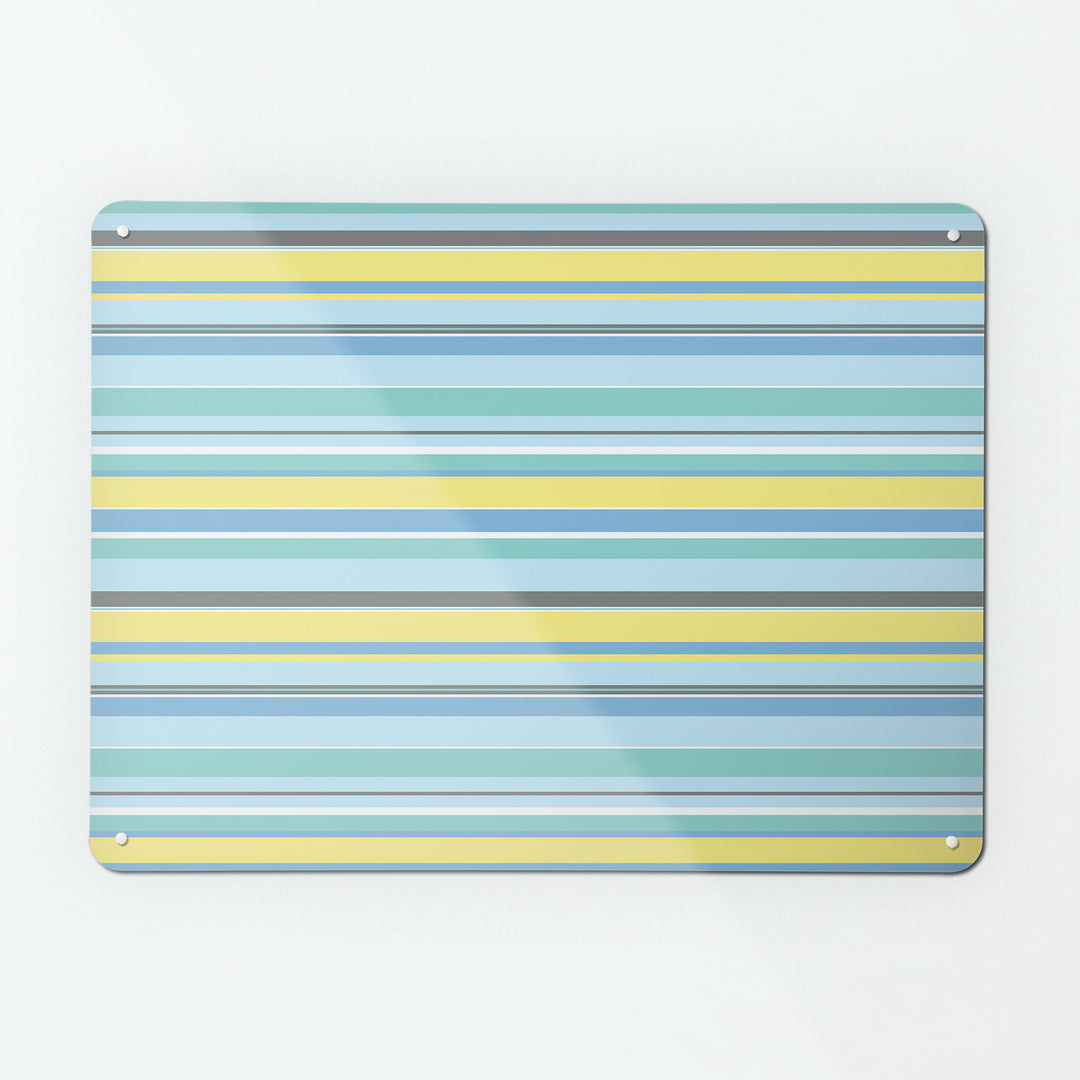 A large magnetic notice board by Beyond the Fridge with a stripes design in beach colour way