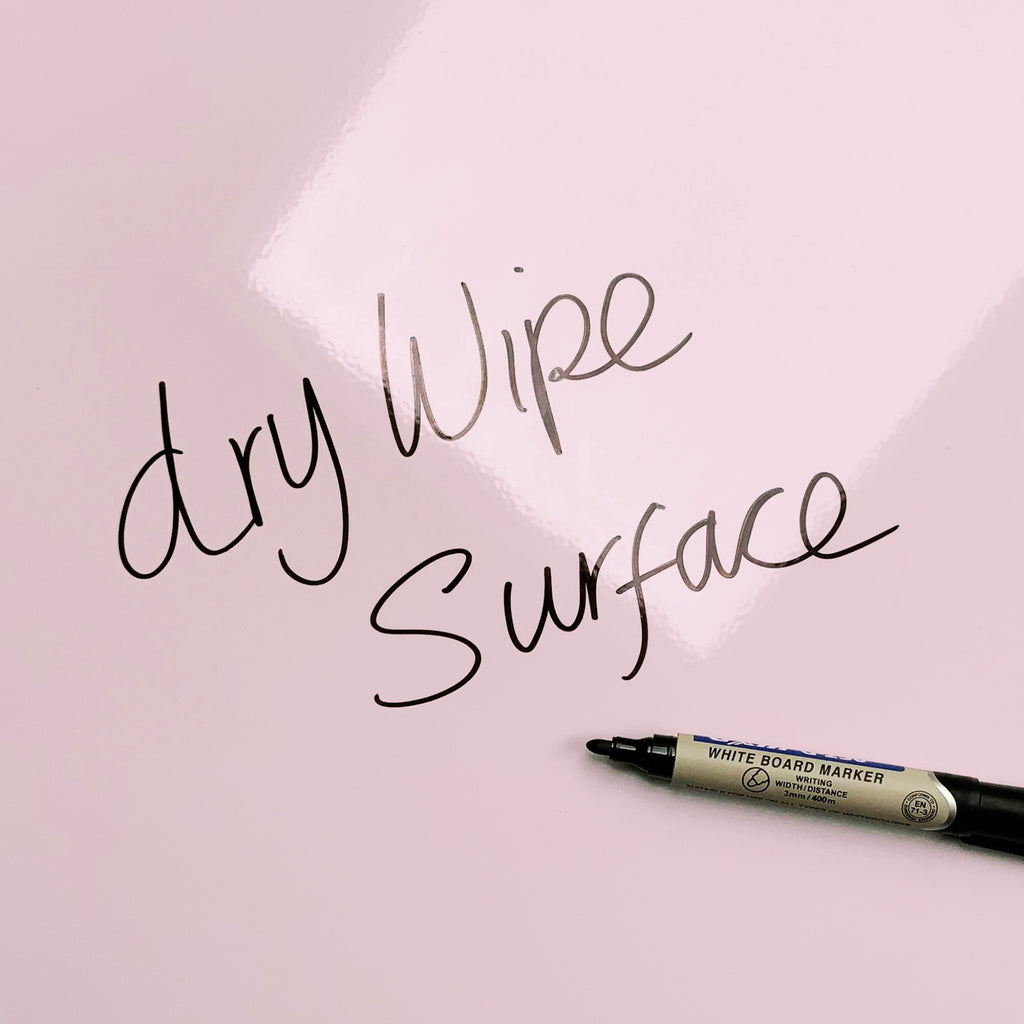 The words dry wipe surface written in marker pen on the Tabby Kitten Tabby Kitten magnetic notice board