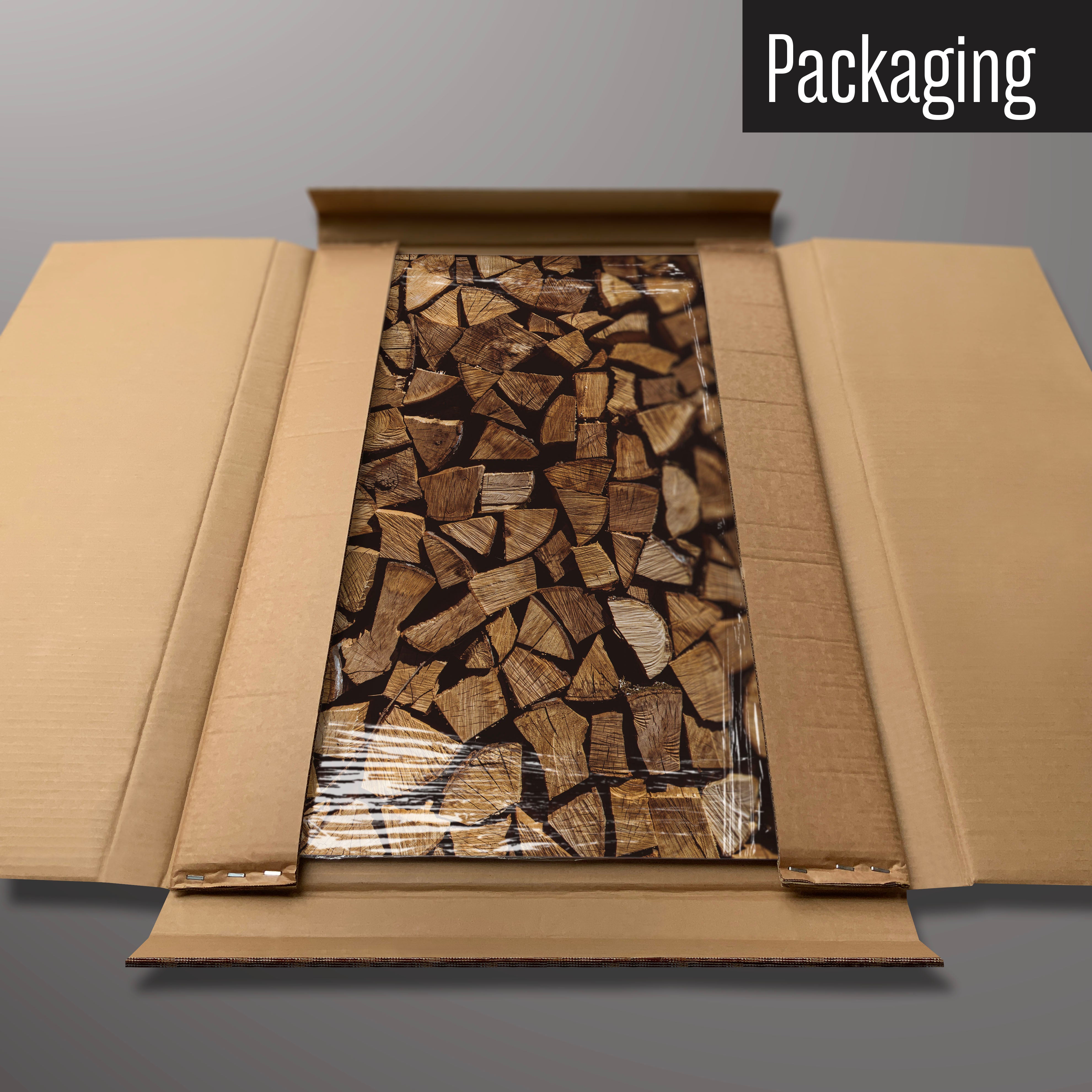 A log pile magnetic board in it’s cardboard packaging