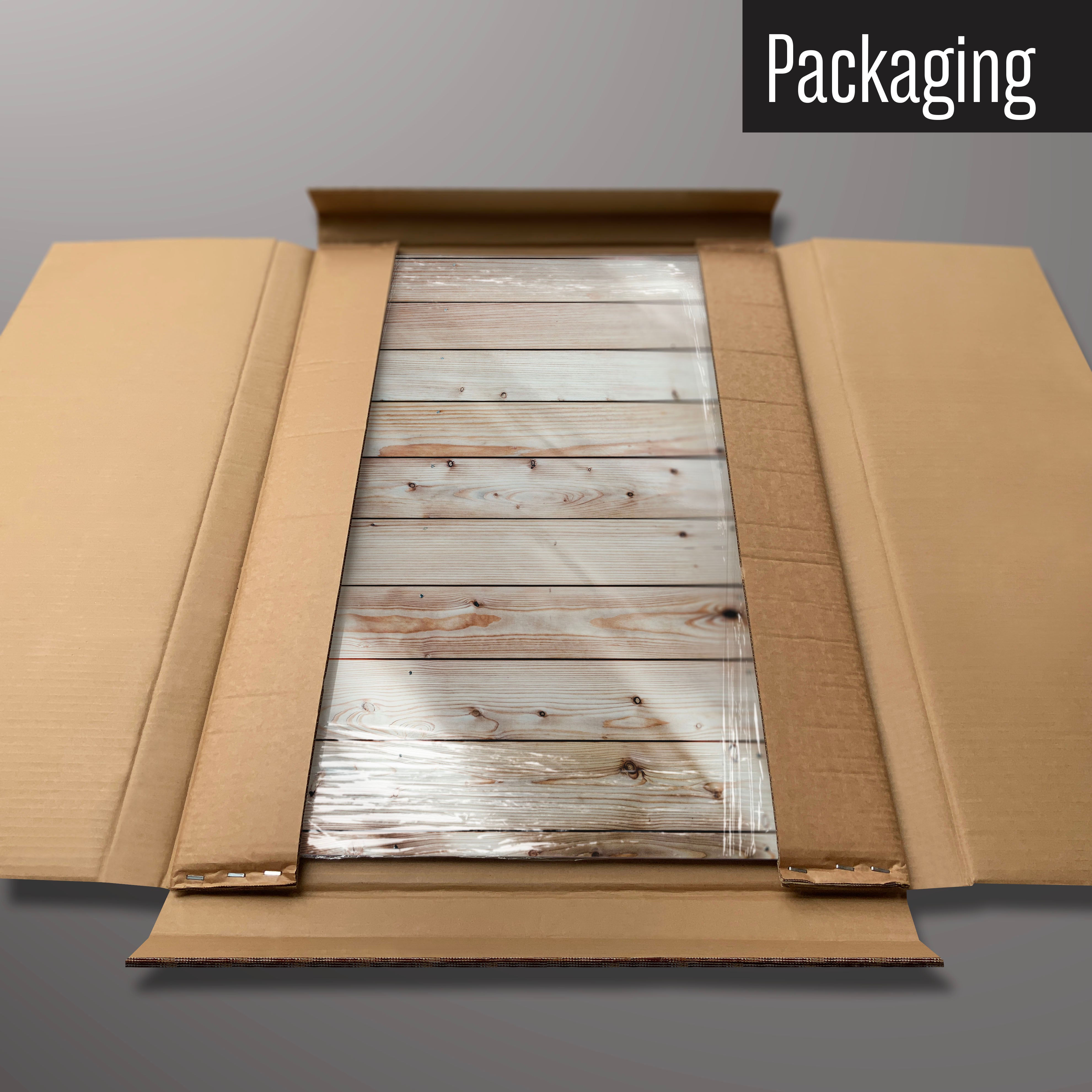 A wood cladding magnetic board in it’s cardboard packaging