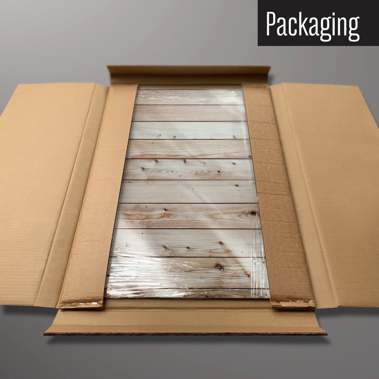 A wood cladding magnetic board in it’s cardboard packaging