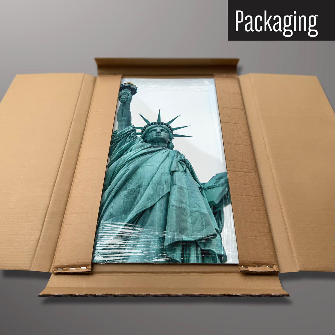 A Statue of Liberty magnetic board in it’s cardboard packaging