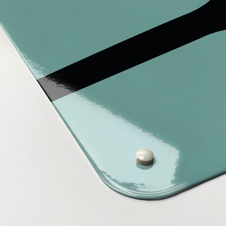 The corner detail of a blue utensils design magnetic board to show it’s high gloss surface