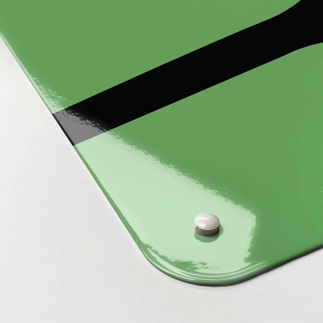The corner detail of a green utensils design magnetic board to show it’s high gloss surface