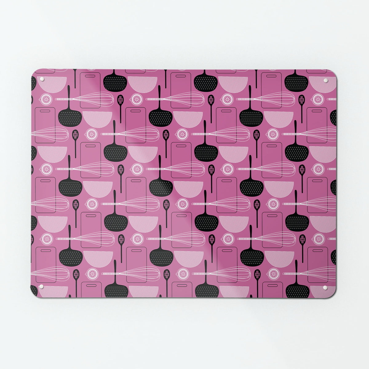 A large magnetic notice board by Beyond the Fridge with a utensils repeat pattern design in pink colour way