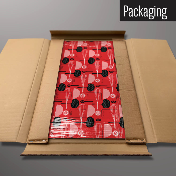 A blue utensils repeat pattern design magnetic board in it’s cardboard packaging