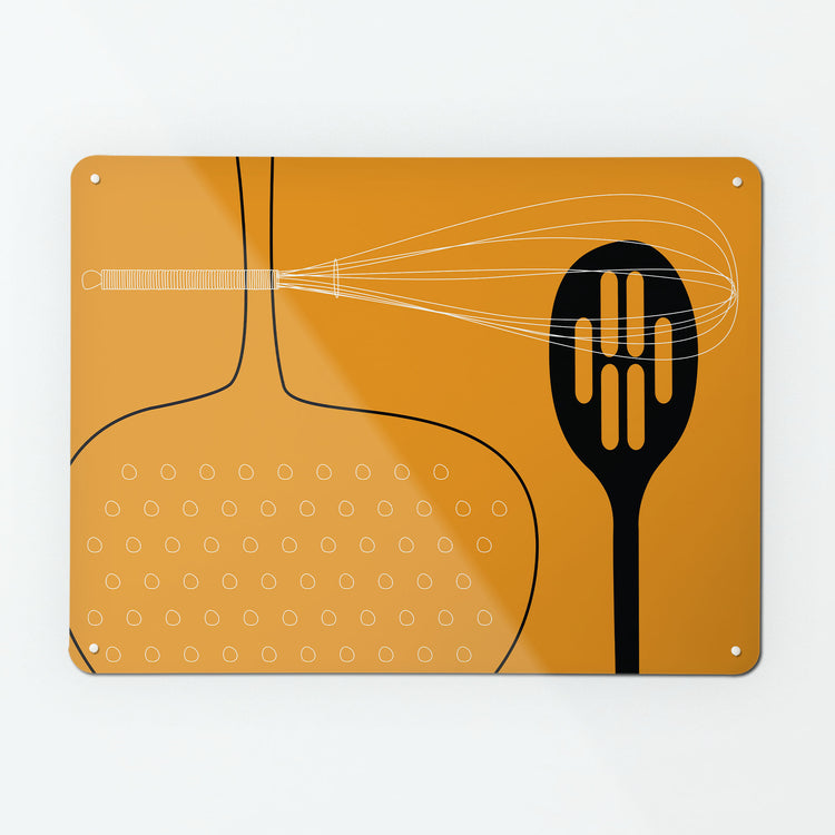 A large magnetic notice board by Beyond the Fridge with a utensils design in orange colour way