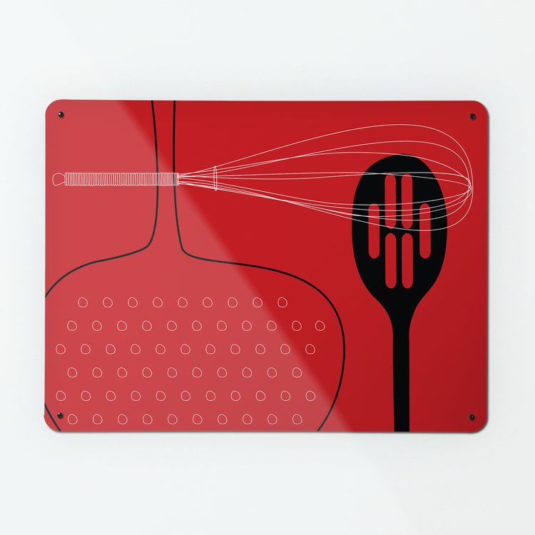 A large magnetic notice board by Beyond the Fridge with a utensils design in red colour way