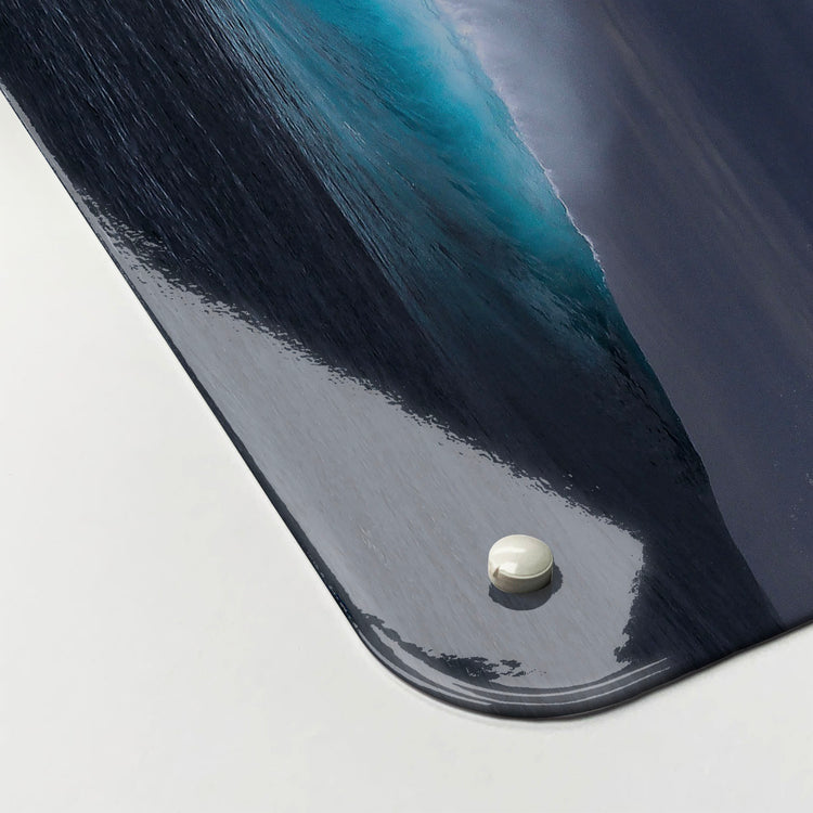 The corner detail of a whale photographic magnetic board to show it’s high gloss surface