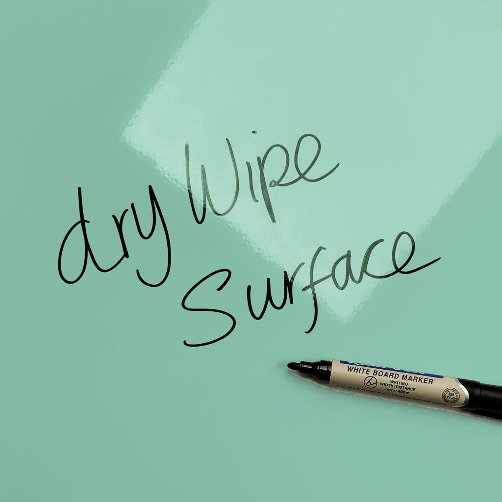 The words dry wipe surface written in marker pen on the 'Wise Owl - Number Square' Wise Owl Number Square magnetic notice board