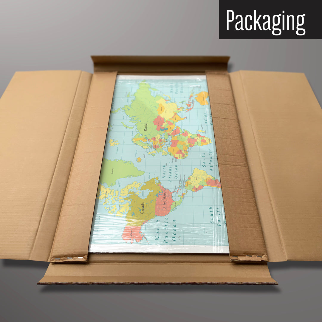 A world map design magnetic board in it’s cardboard packaging