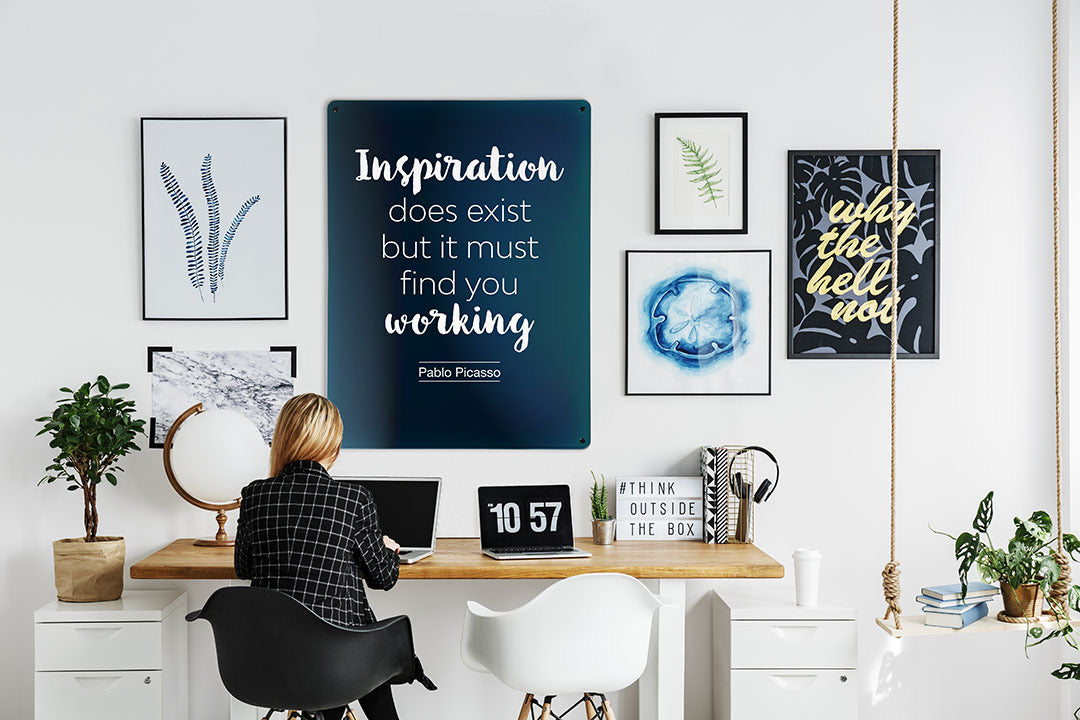 Inspiration does exist magnetic board in a gallery wall at a desk