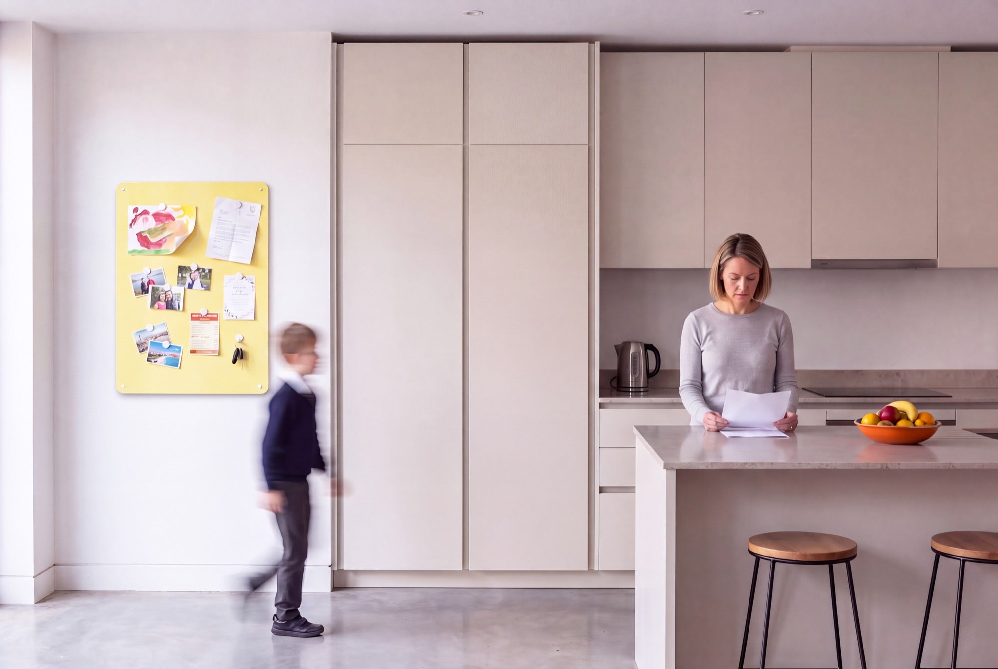 A plain panel beside an integrated fridge